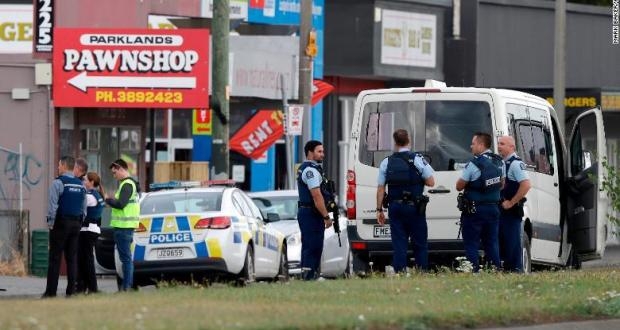 Police stand outside a mosque in Linwood, Christchurch, New Zealand, Friday, March 15, 2019. Multiple people were killed during shootings at two mosques full of people attending Friday prayers. (AP Photo/Mark Baker)