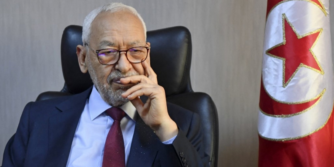 Parliament speaker Rached Ghannouchi, head of the Islamist-inspired Ennahdha party, looks on during an interview with AFP at his office in Tunis on March 31, 2022. The speaker of Tunisia's parliament rejected President Kais Saied's dissolution of the assembly the previous day. (Photo by FETHI BELAID / AFP)